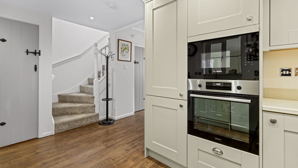 The entrance leads straight to the kitchen