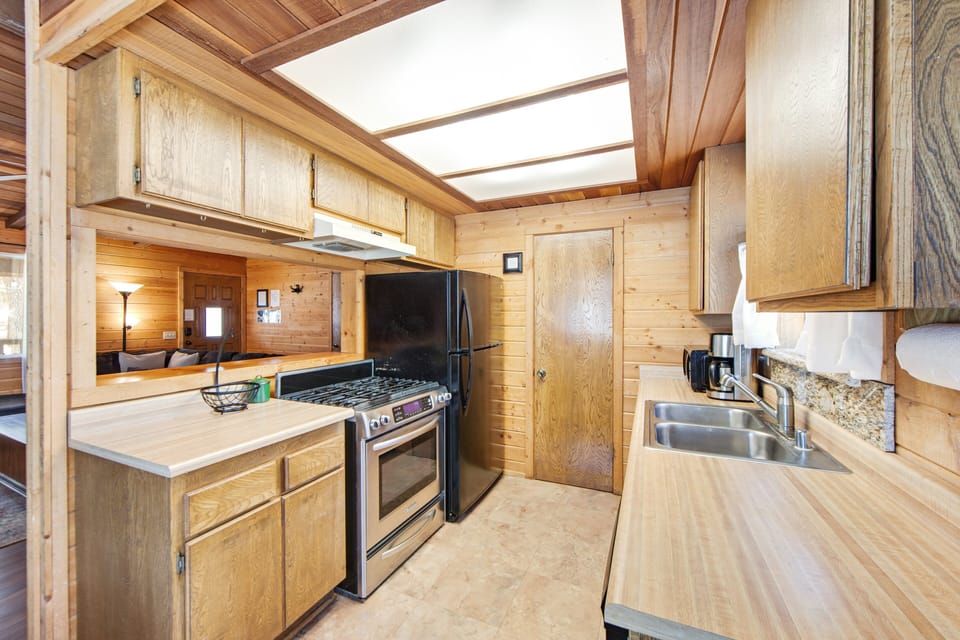 Spacious kitchen featuring clean design, ample storage, and natural light.