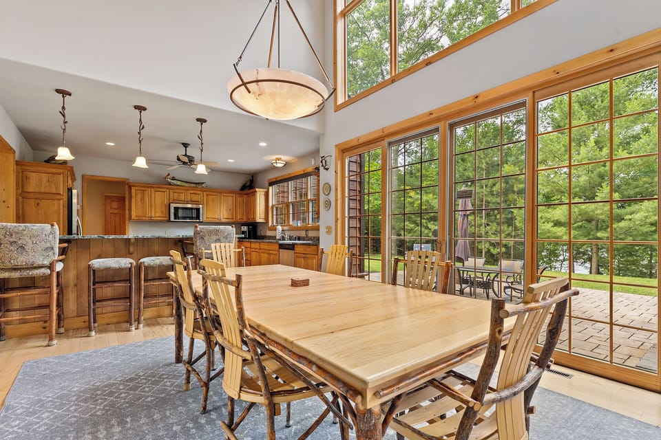 Enjoy meals together around a table that comfortably seats 6 with additional seating at the kitchen barstools.
