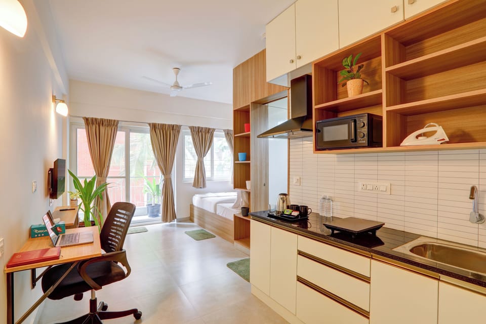 Suite, Balcony, City View | Premium bedding, individually furnished, desk, laptop workspace