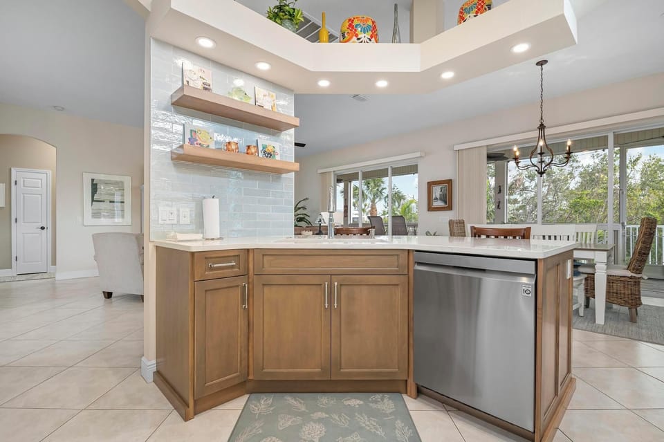 Beautiful kitchen with quartz counters and stainless appliances