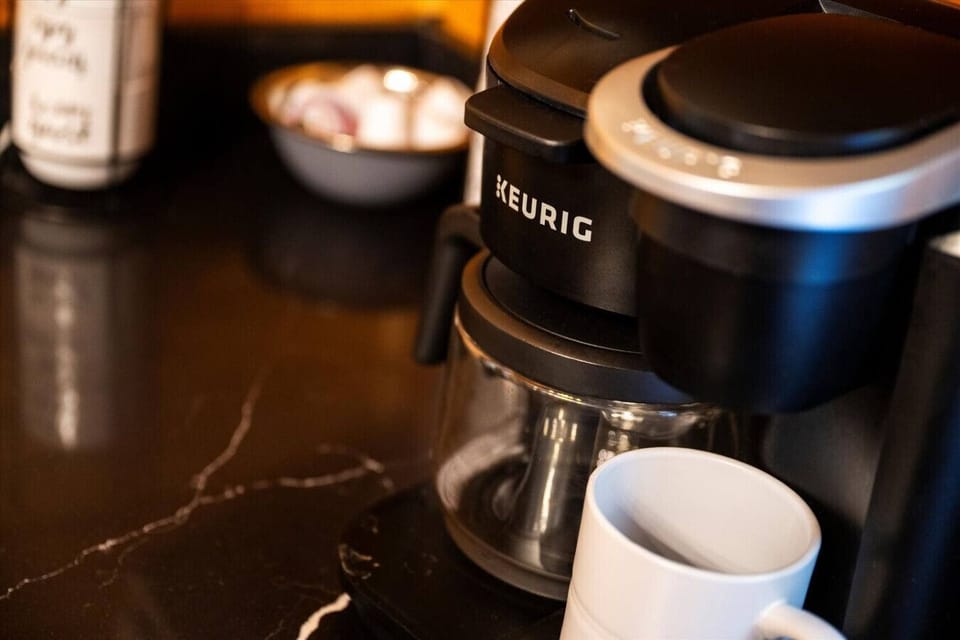 Whether you prefer a classic drip brew or a quick Keurig cup, your morning coffee routine is effortless here—made even better when enjoyed on the porch with mountain air.