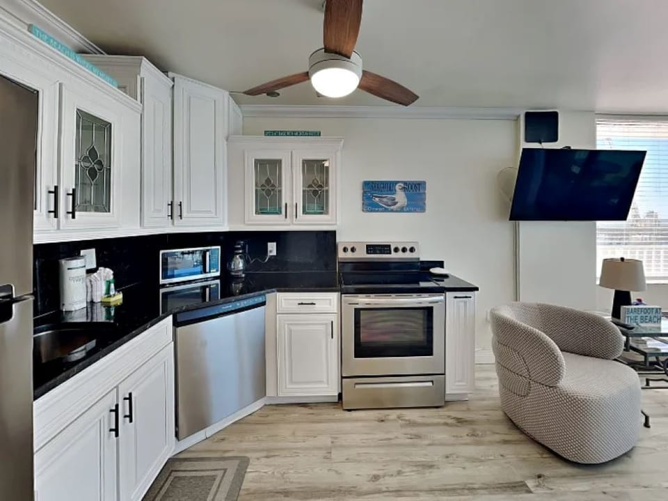Kitchen With Refrigerator, Dishwash & Stove