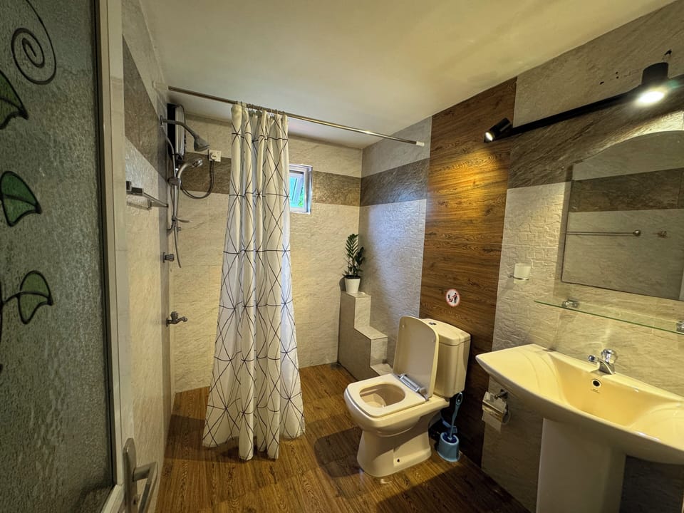 Family Triple Room, Multiple Beds, Mountain View | Bathroom | Rainfall showerhead, hair dryer, towels, soap