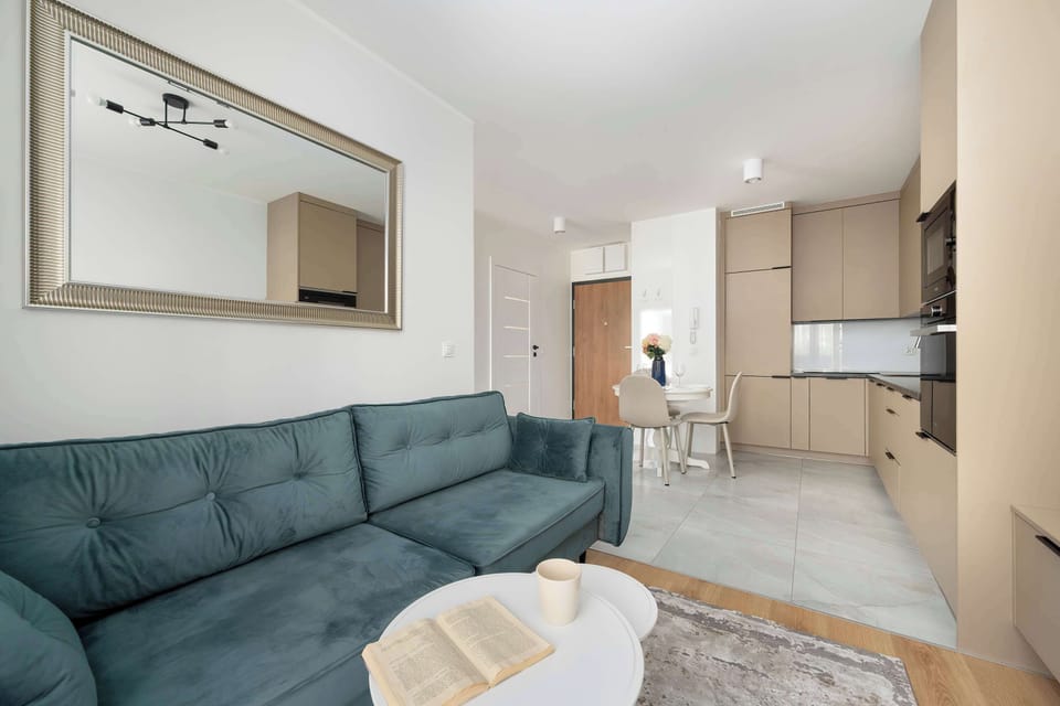 A detailed view from the sofa’s perspective – highlighting the stylish cushions and inviting fabric.
