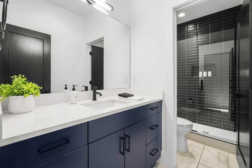 Thoughtfully decorated with a touch of greenery for a fresh, welcoming feel.