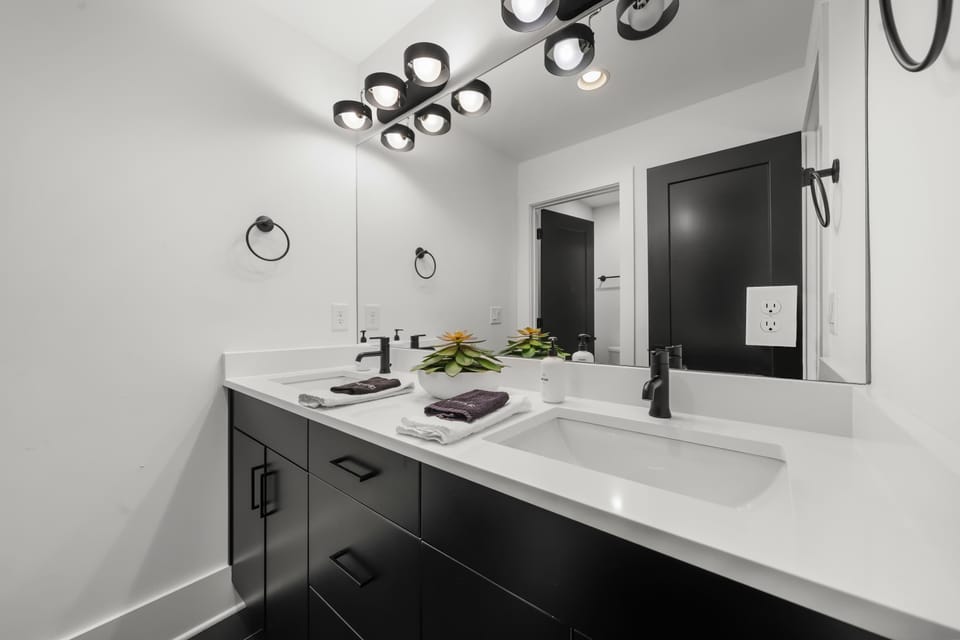Fully stocked with fresh towels and premium essentials for guest comfort.