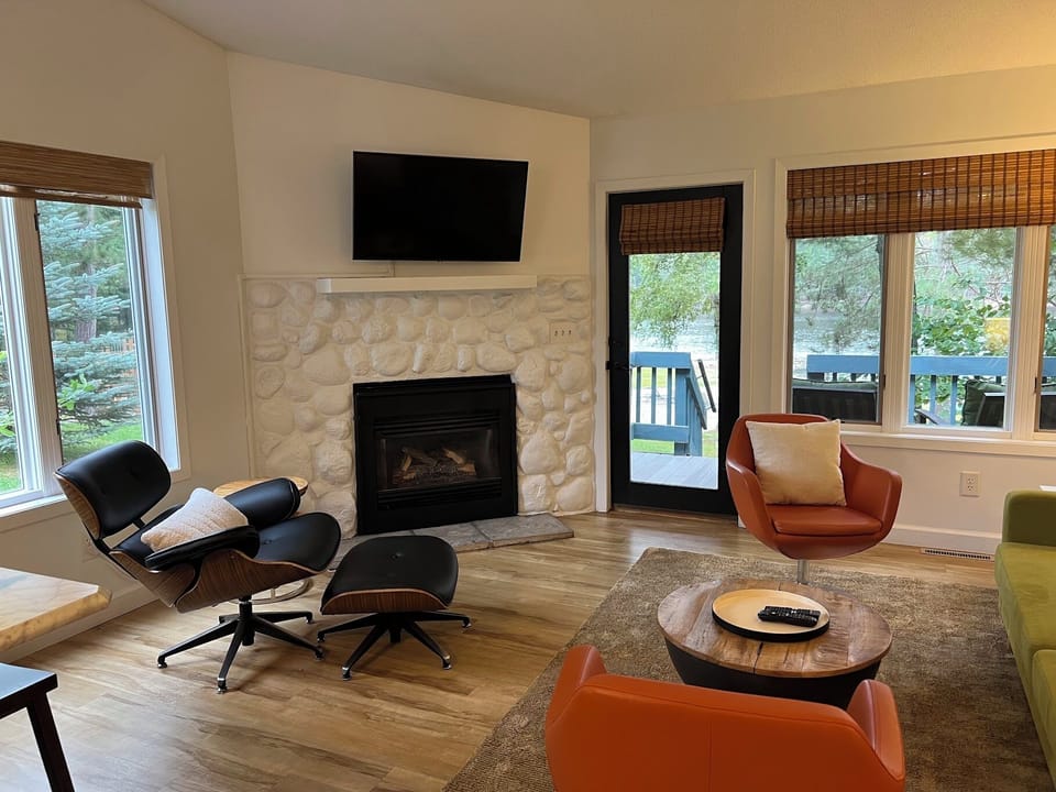 Enjoy lake views from your cozy living room.