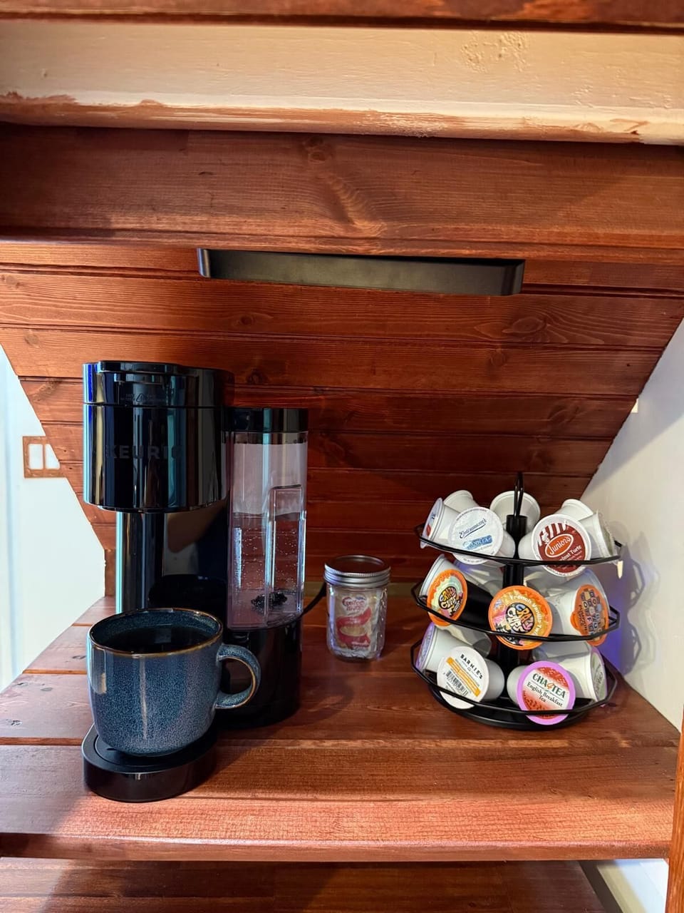 Brew a cozy cup with our Keurig station and variety of pods.