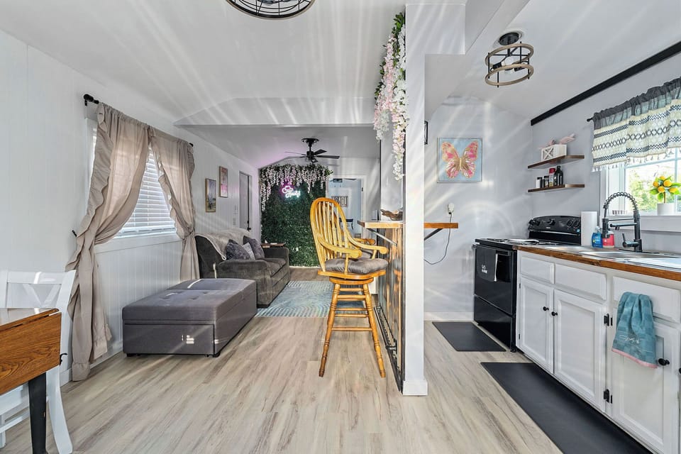 The gray sofa bed is no longer there, it has been replaced by a twin size bed