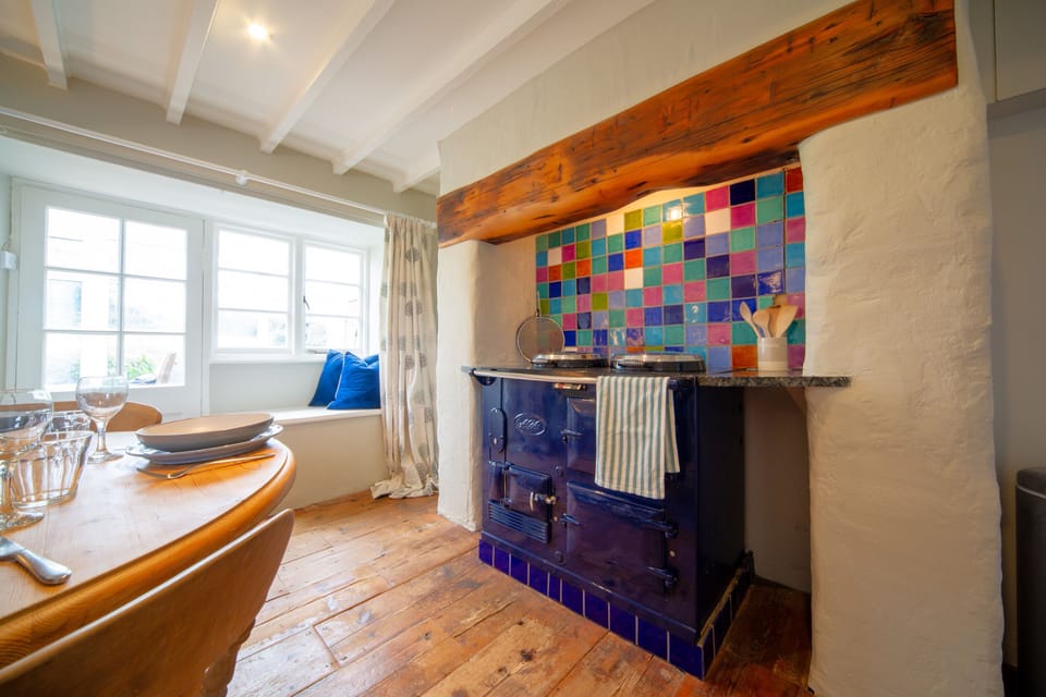 Penrose Cottage in Crackington Haven, Bude. Ground floor: Feature AGA takes centre stage in the Dining room