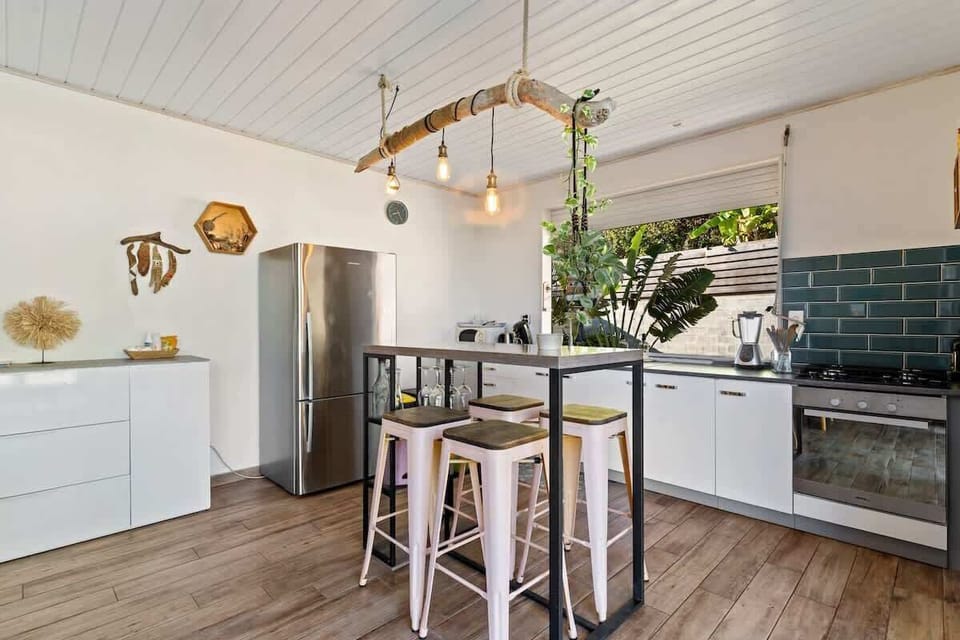 Bright open kitchen with bar seating