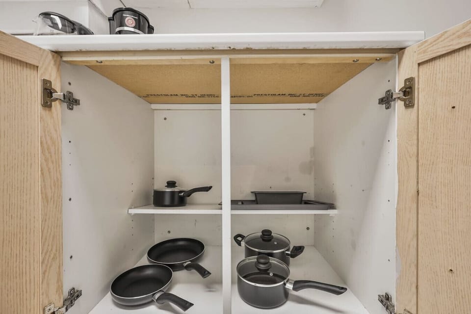 Our fully stocked kitchen includes all the essential pots and pans you need. Prepare any meal with ease using the clean and ready cookware provided for your comfortable stay.