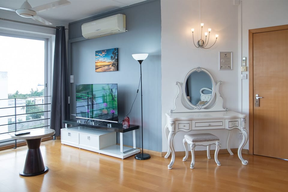 Junior Suite, Sea View | Living area | LED TV