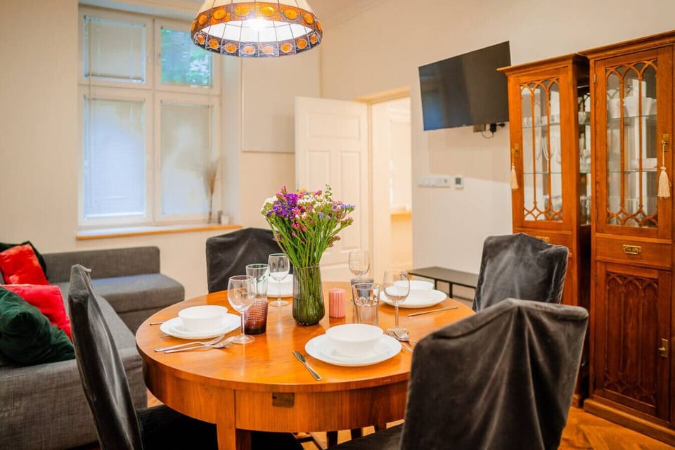 Living Room with Sofa Bed, Smart TV and Dining Table | Book Now with RENTUJEMY.COM