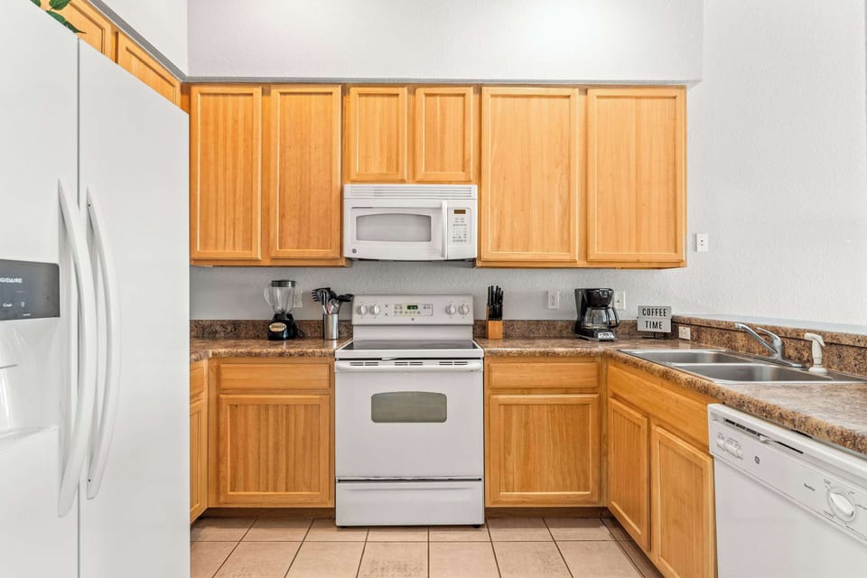 Condo, Multiple Beds, Balcony, Garden View (Caribe Cove Charm) | Private kitchen | Fridge, microwave, oven, stovetop