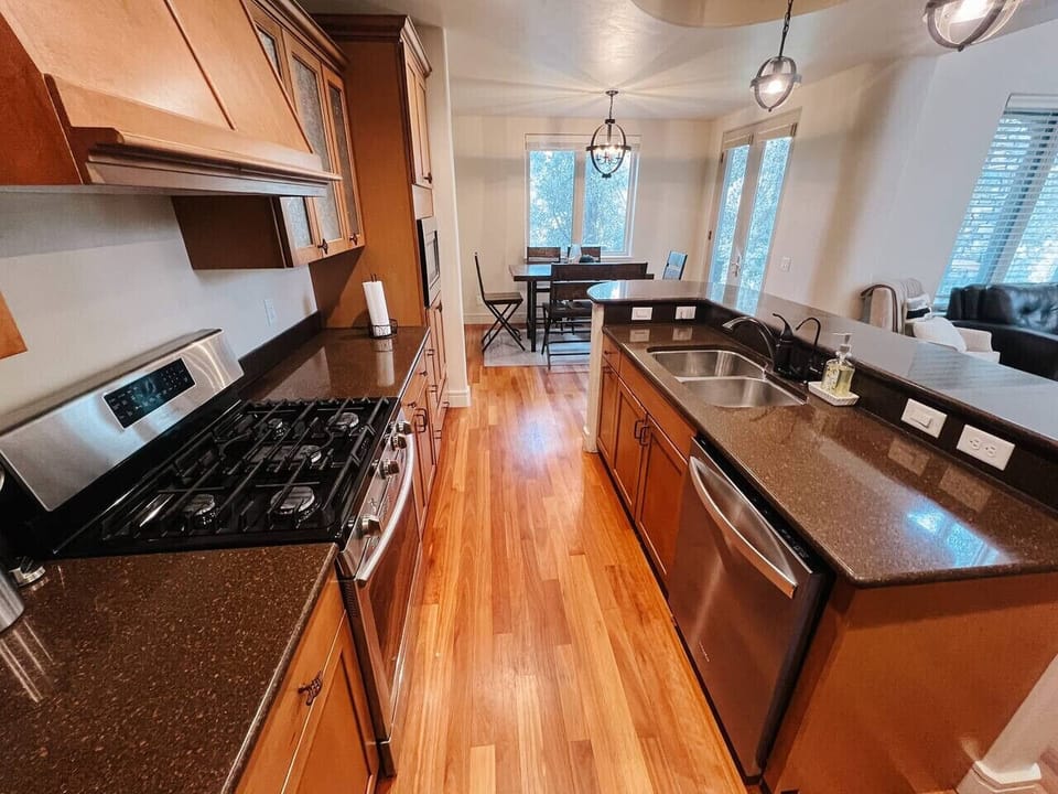 Open Kitchen with Stainless Steel Appliances