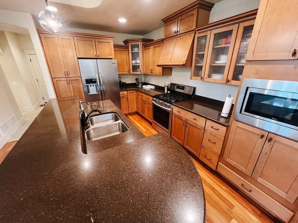 Open Kitchen with Stainless Steel Appliances