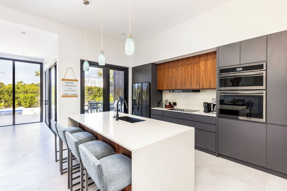 Modern kitchen boasting all neessary appliances plus a nespresso machine 