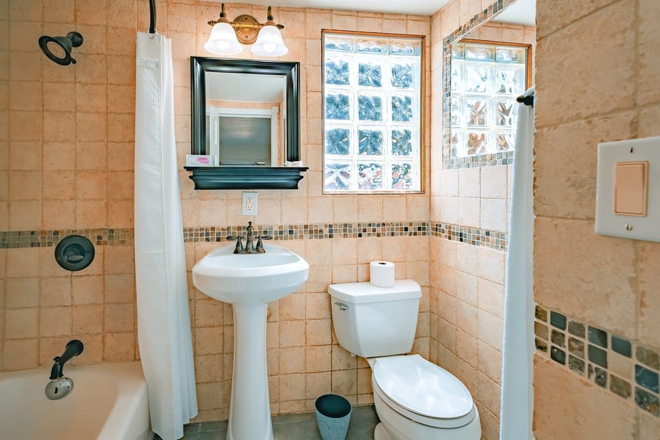 A clean, contemporary bathroom designed as your personal spot to refresh and recharge.