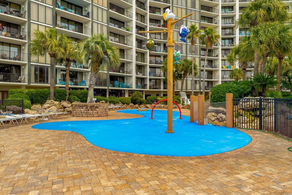Kids will love the interactive splash zone, complete with water features and colorful sprayers, just steps from the main resort pool