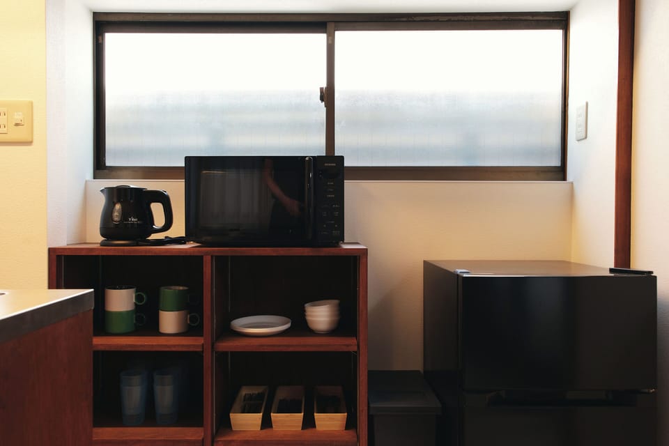 Apartment | Private kitchen | Fridge, microwave, cookware/dishes/utensils