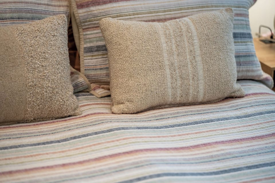 Relax, unwind, and enjoy a peaceful night in the cozy master suite.