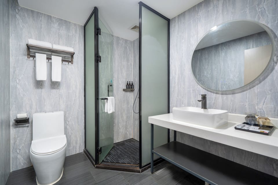 Shower, free toiletries, hair dryer, towels