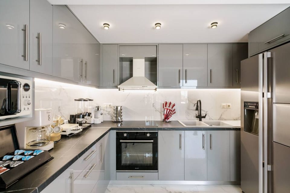 Fully equipped kitchen with modern appliances, cookware, and essentials, ideal for guests who enjoy home-cooked meals.