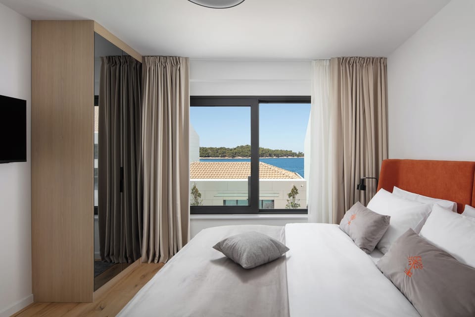 Deluxe 2 Bedrooms Suite with Balcony, Sea View | In-room safe, blackout drapes, soundproofing, iron/ironing board