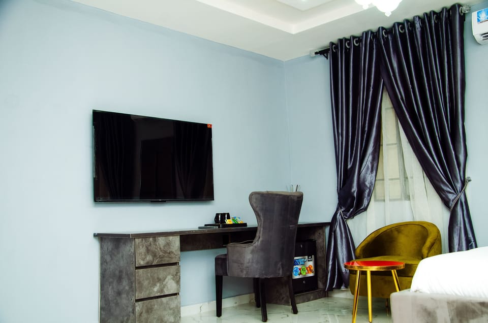 In-room safe, desk, laptop workspace, iron/ironing board