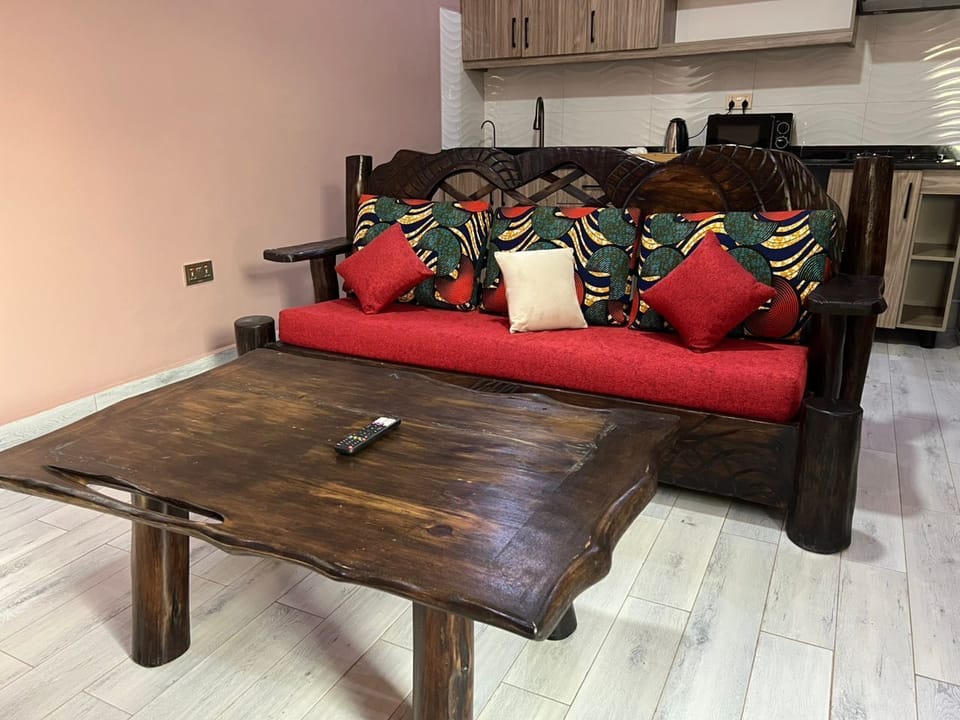 Deluxe Double Room | Living area | Flat-screen TV, fireplace, DVD player, first-run movies