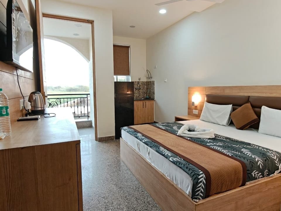 Premium Room, Balcony, City View | Desk, laptop workspace