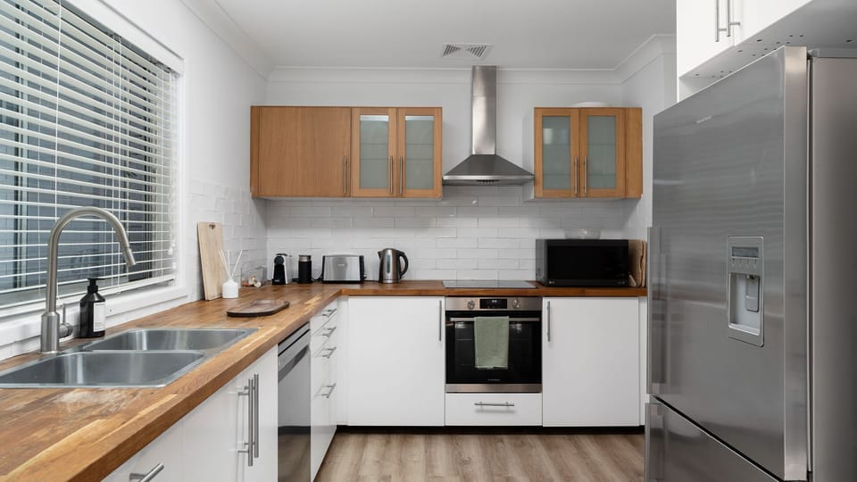 White and Wood-Toned Kitchen Space