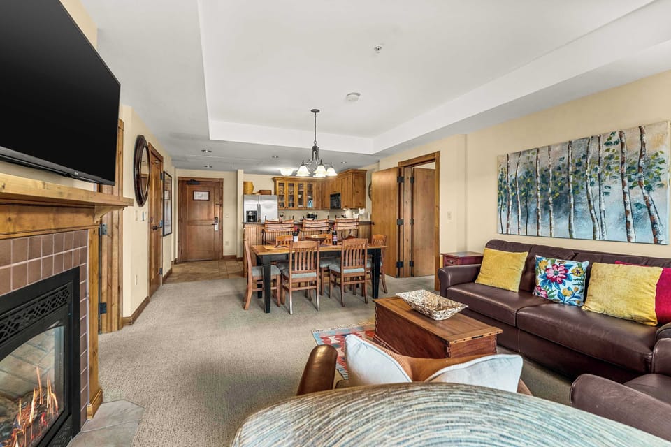 Cozy up in the living room and dining area | Listed with @BookTraverse