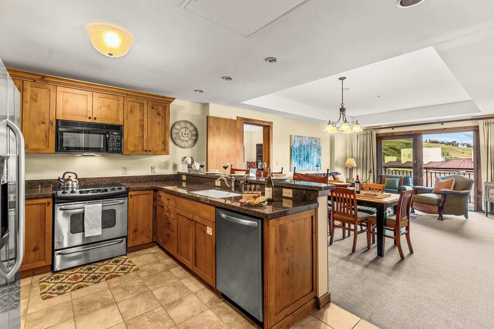 Full kitchen where you can cook and dine| Listed with @BookTraverse