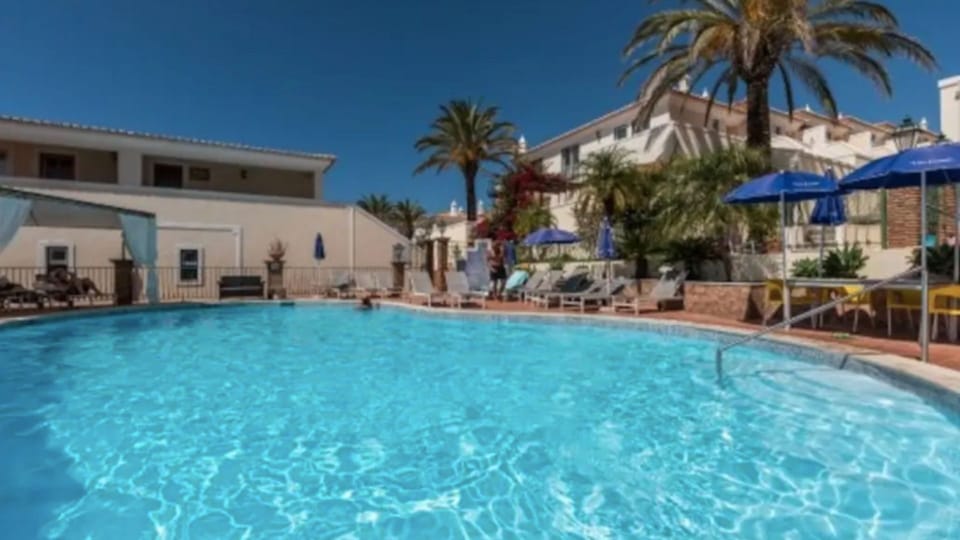 Access to the shared condominium pool (the house does not have a pool view).