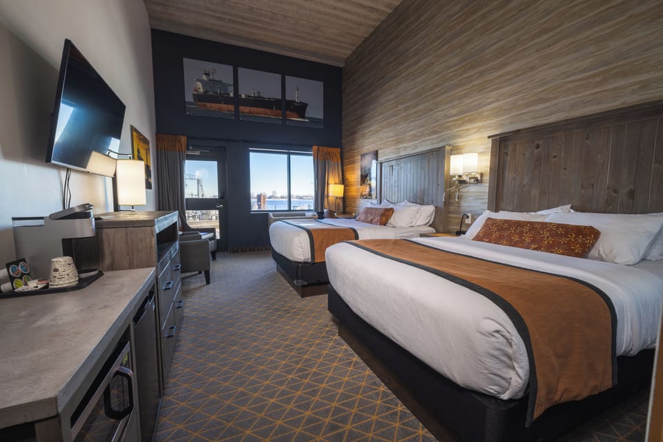 Two Queen Patio Room | Premium bedding, desk, laptop workspace, iron/ironing board