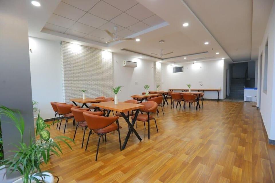 Shared fridge, highchair, dining tables