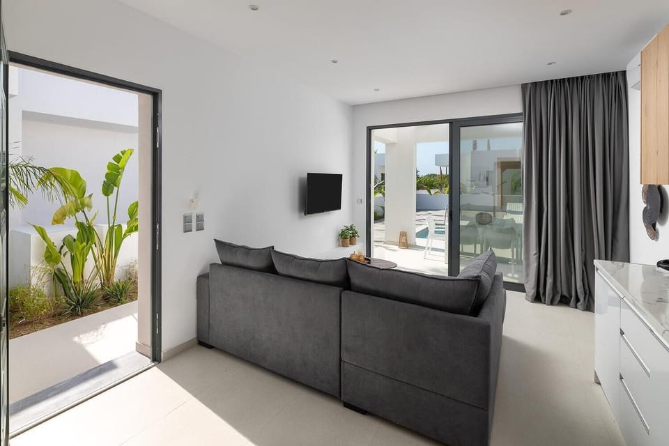 Living room with sofas, WiFi internet, and satellite TV
