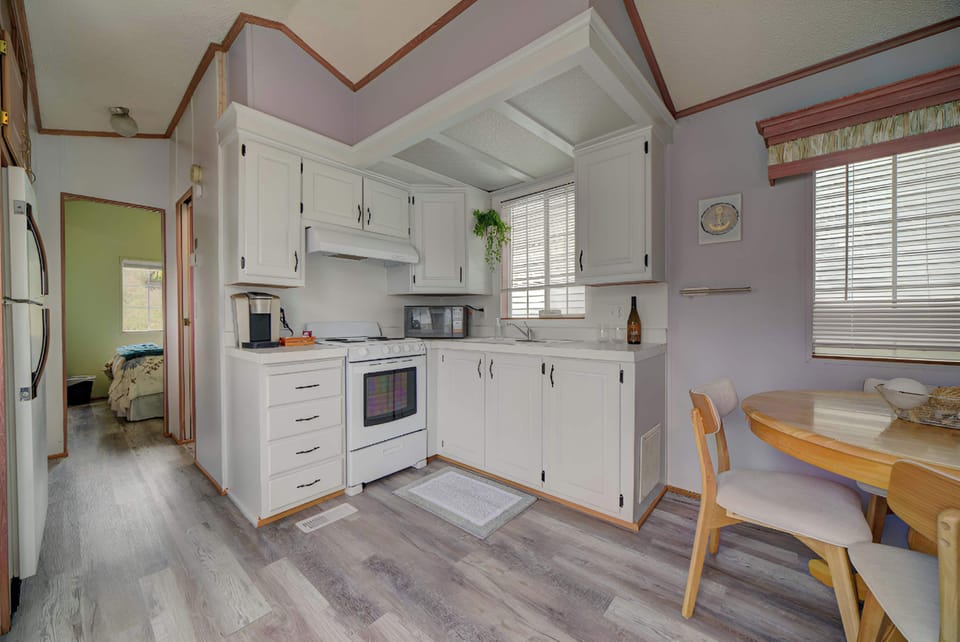 Dining table beside kitchen