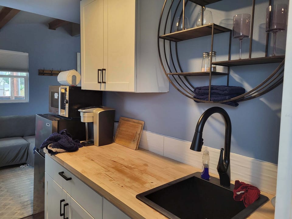 Kitchenette with deep sink.