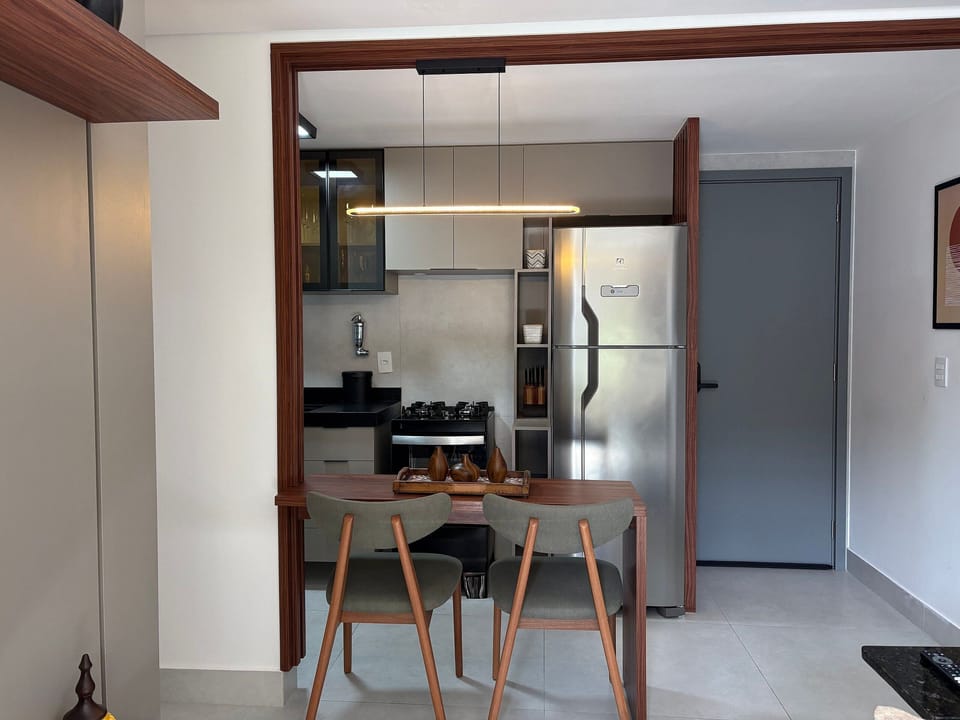 Basic Apartment | Private kitchen | Toaster, cookware/dishes/utensils, dining table