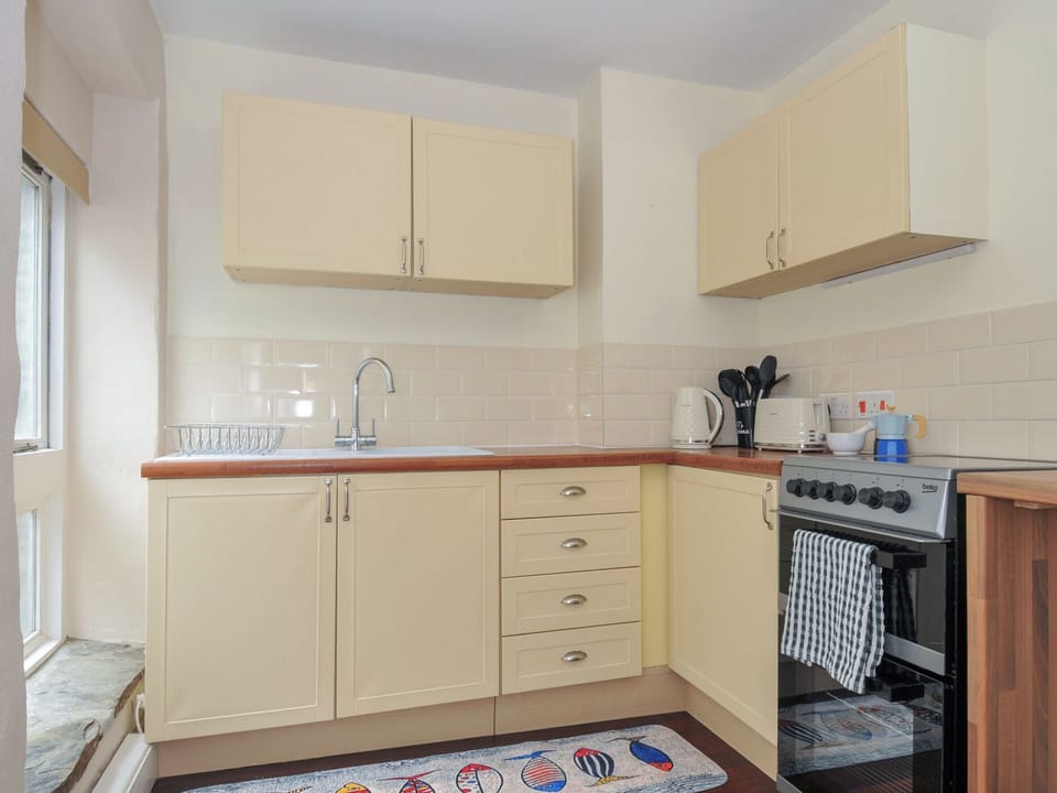 Fridge, microwave, toaster, cookware/dishes/utensils