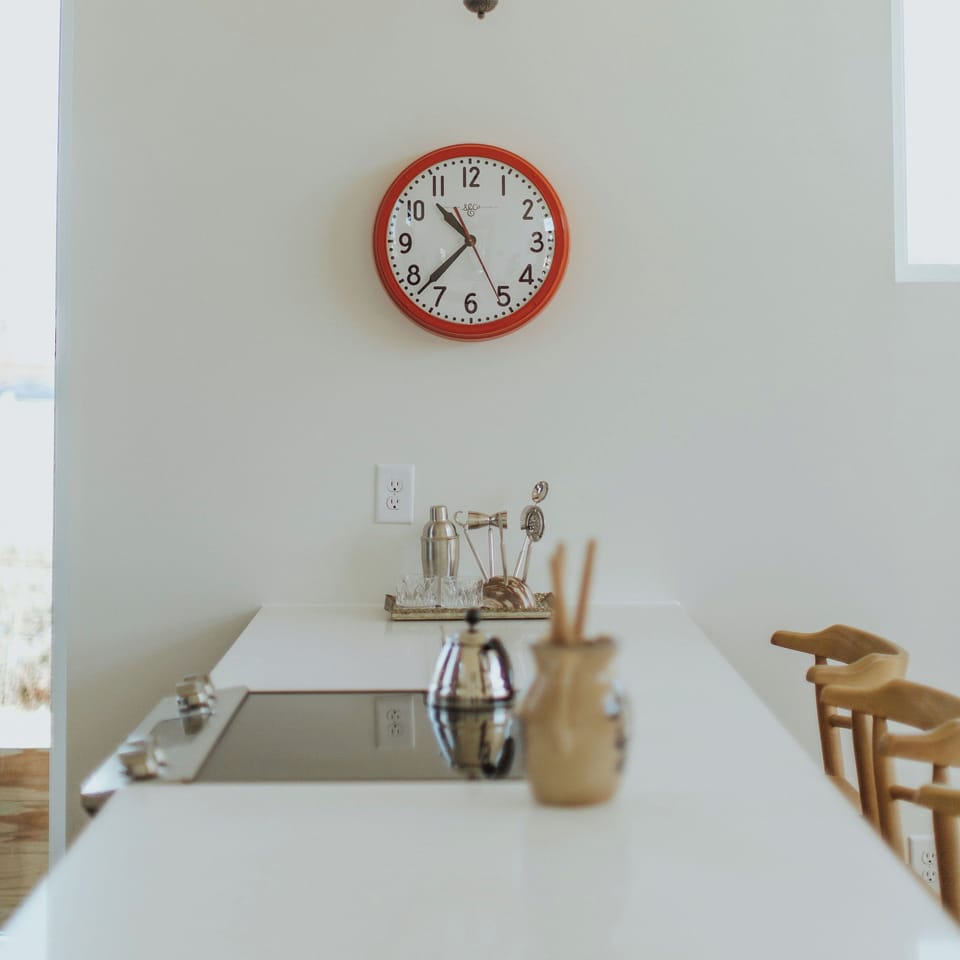 Conversational kitchen featuring a slide-in range facing peninsula seating