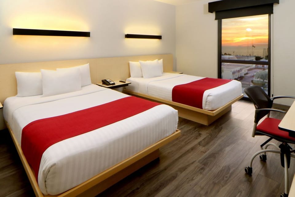 Drift off as sunset colors glow through your window.