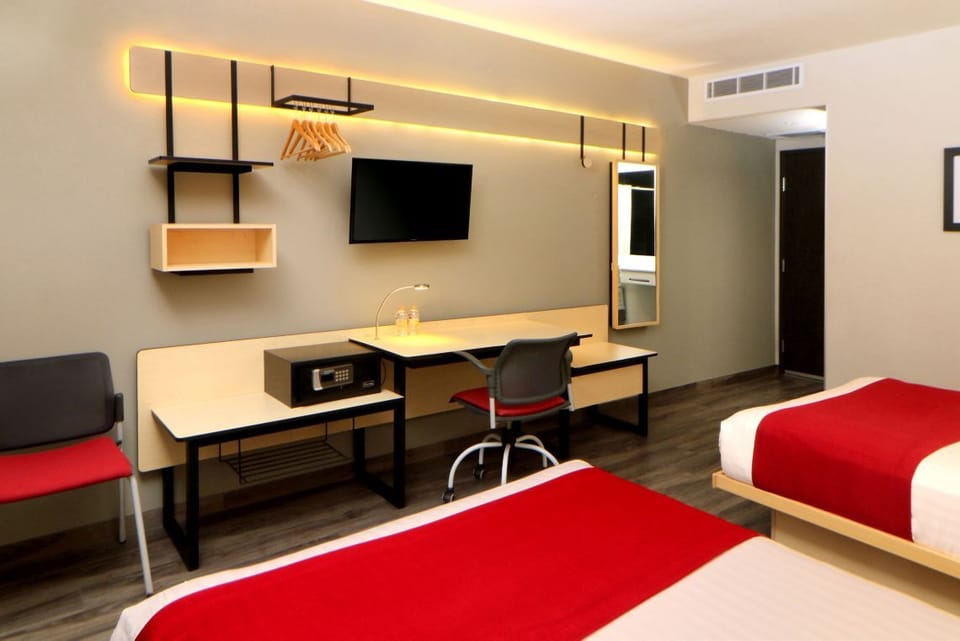 Plan tomorrow at the oversized desk with soft ambient lighting.