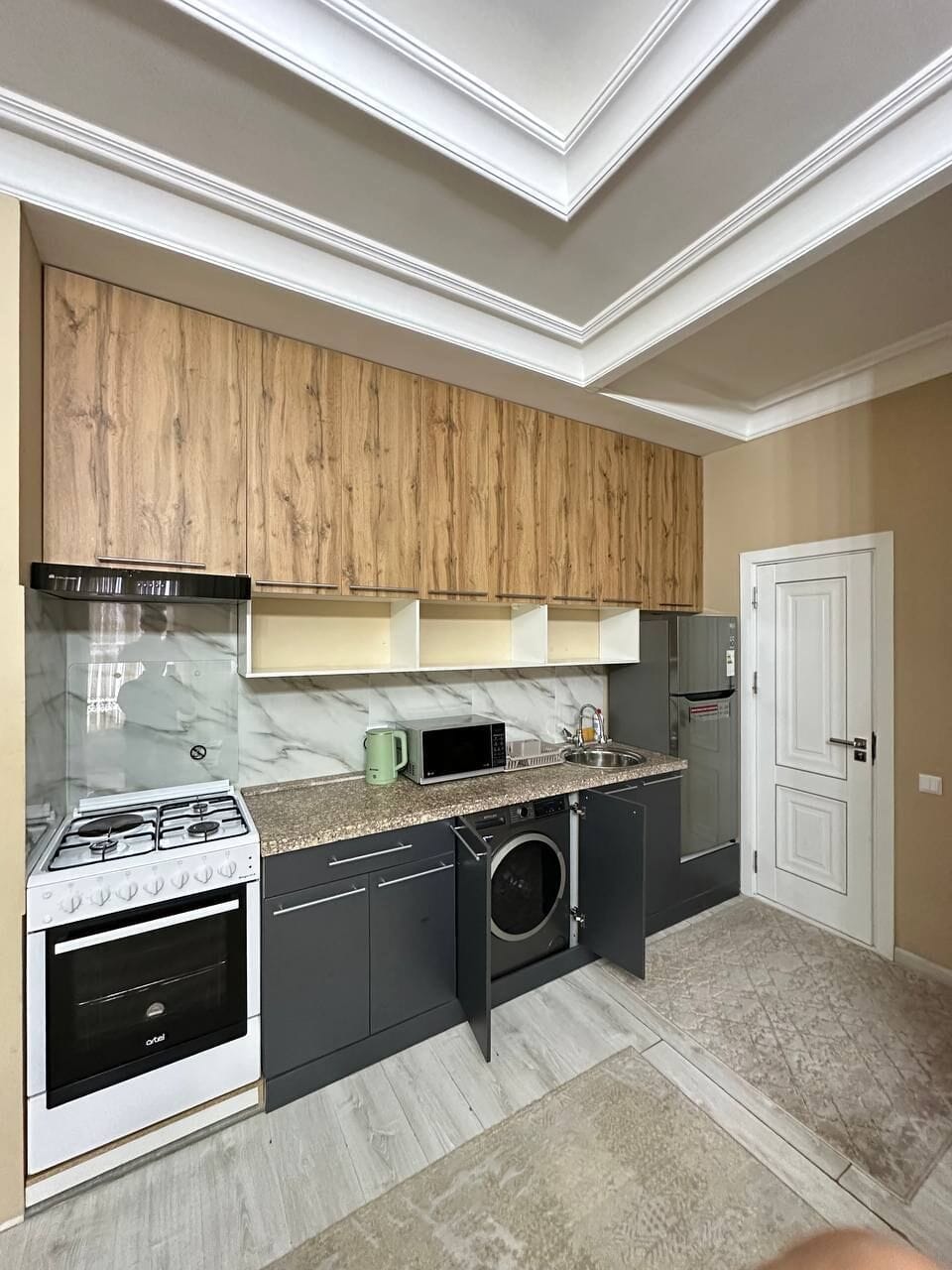 Comfort Apartment | Private kitchen | Full-size fridge, microwave, oven, stovetop