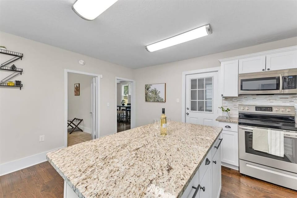 Open Kitchen. Sleek, spotless, and stocked for every craving.