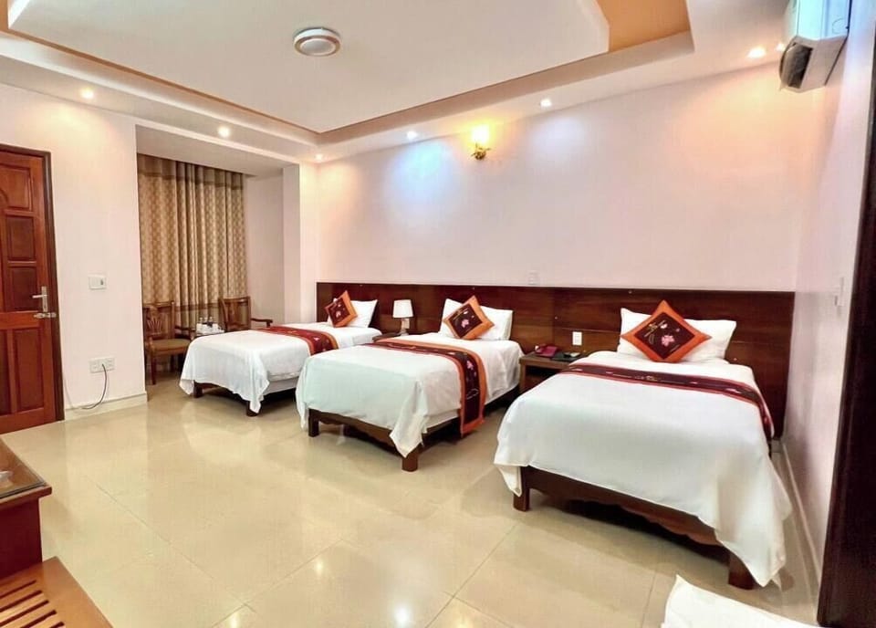 Panoramic Triple Room | Minibar, desk, WiFi (free), bed sheets